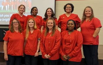 Vantage Adult Education Practical Nursing Students stand together after Pinning Ceremony. 